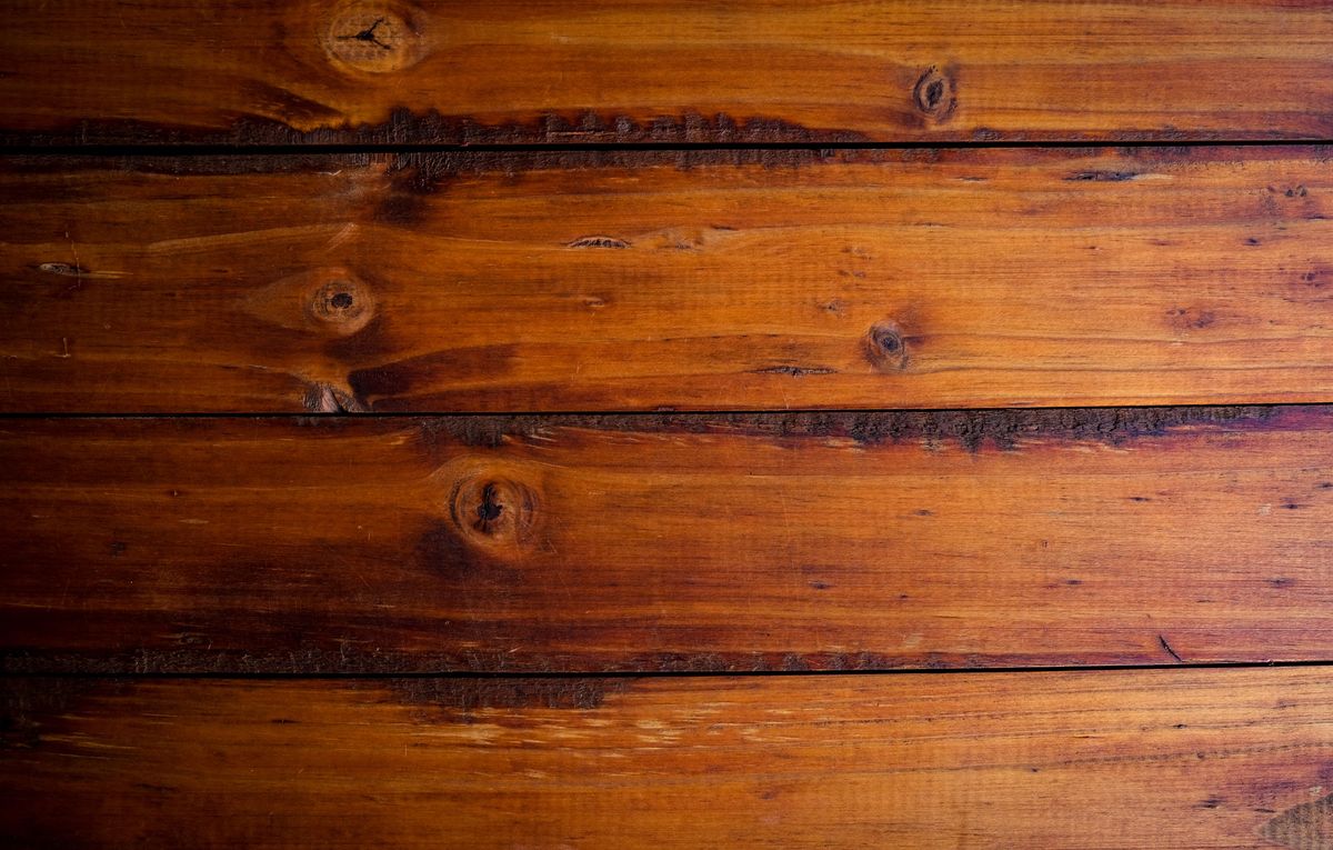 Close-up of warm hardwood floor planks with natural grain