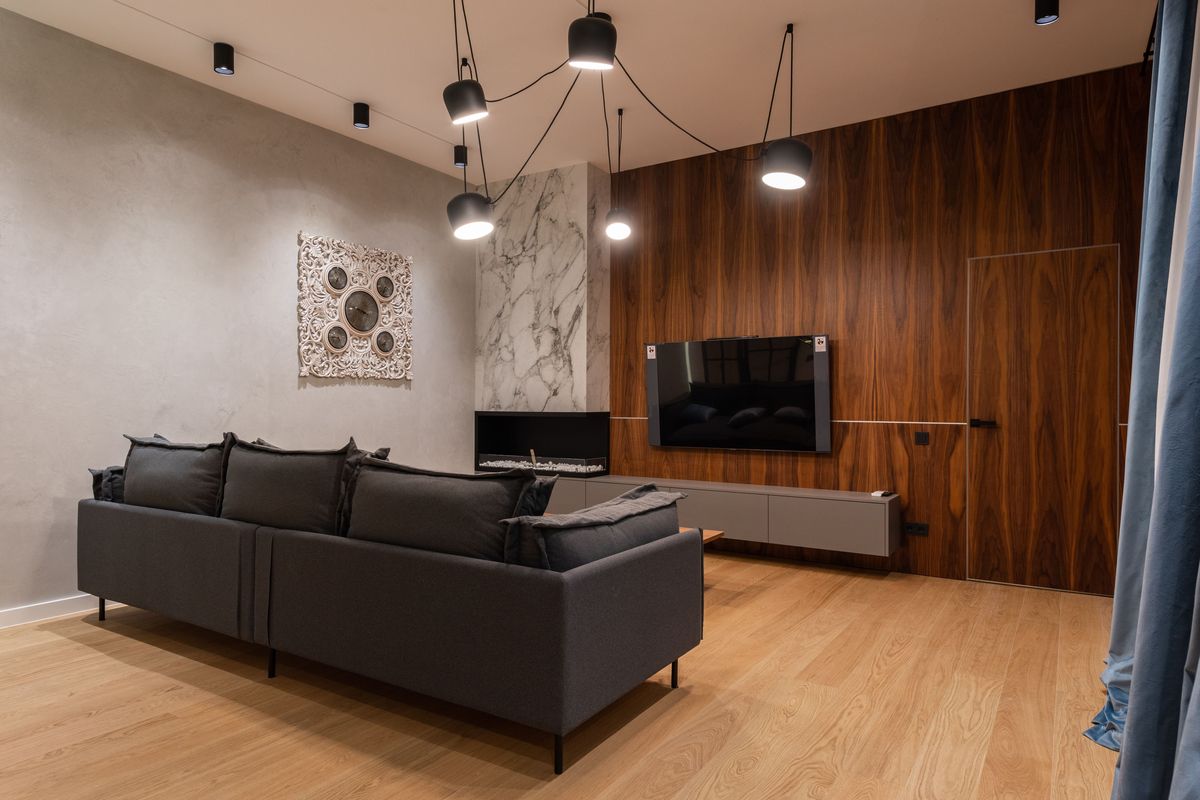Modern living room with light oak plank flooring